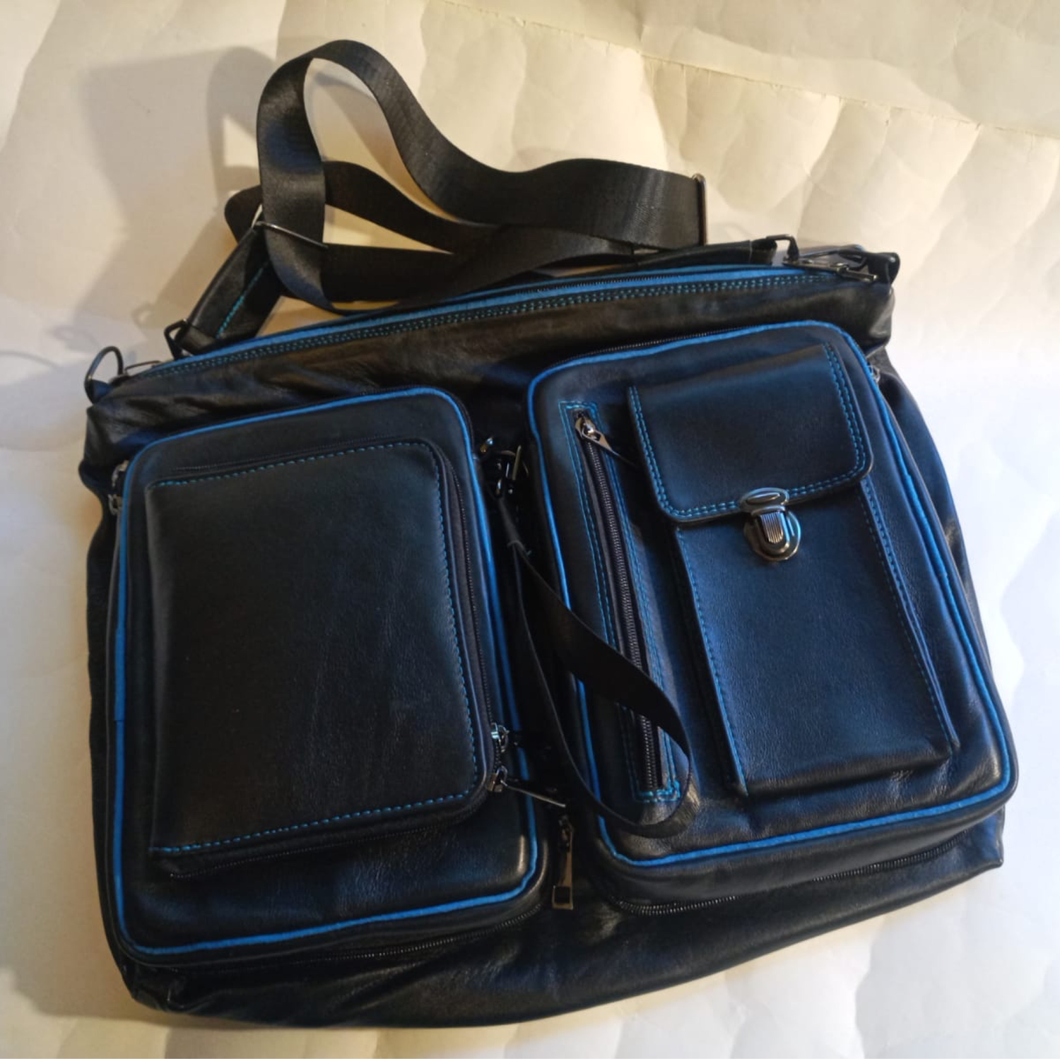 Фото №1 к отзыву покупателя Kozhevnikova70@mail.ru о товаре Мужская складная сумка трансформер из натуральной кожи