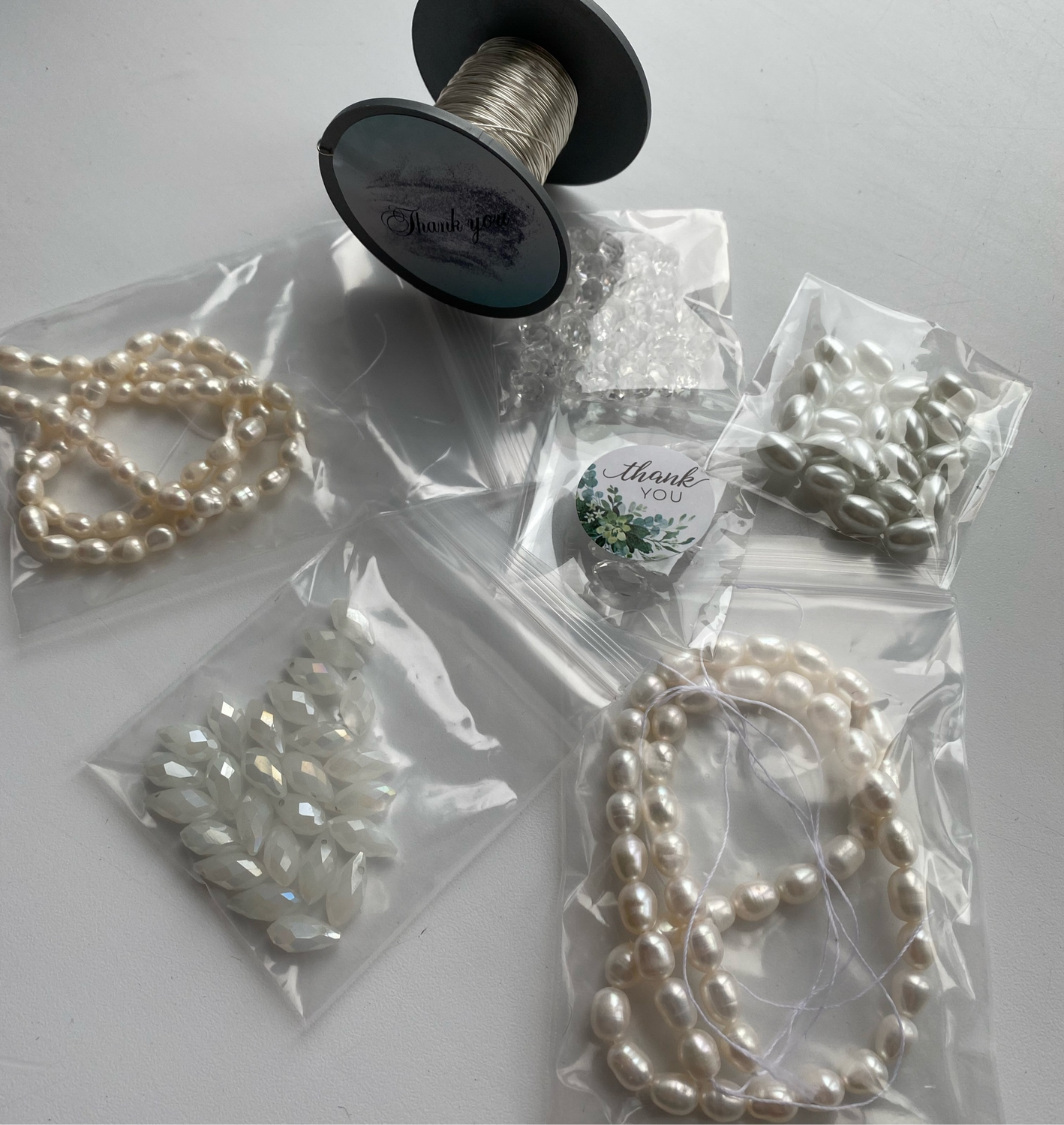 Фото №1 к отзыву покупателя Mikhailova accessorises о товаре Проволока 0.4мм с посеребренным защитным покрытием 30 метров и еще 3 товара