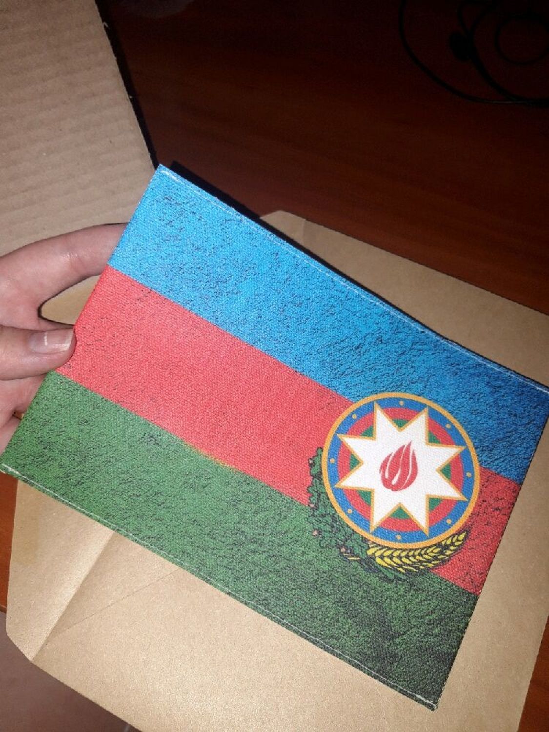 Photo №1 к отзыву покупателя Mari Lunina о товаре Обложка на паспорт "Герб/Флаг Азербайджан"