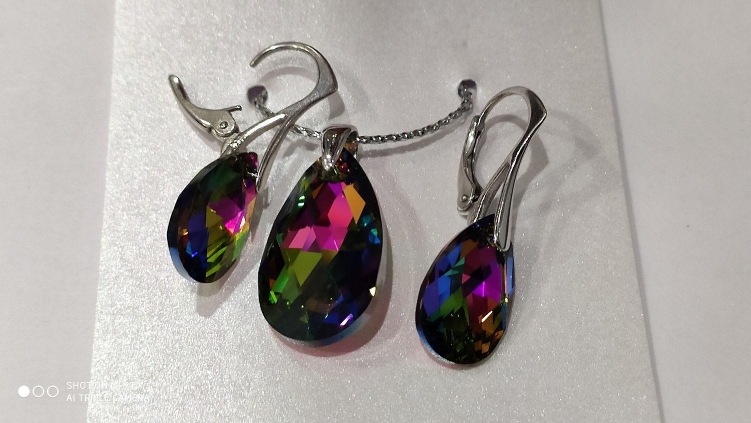 Фото №1 к отзыву покупателя Мохова о товаре Серебряный комплект Swarovski, серьги и кулон с кристаллами Сваровски и еще 1 товар
