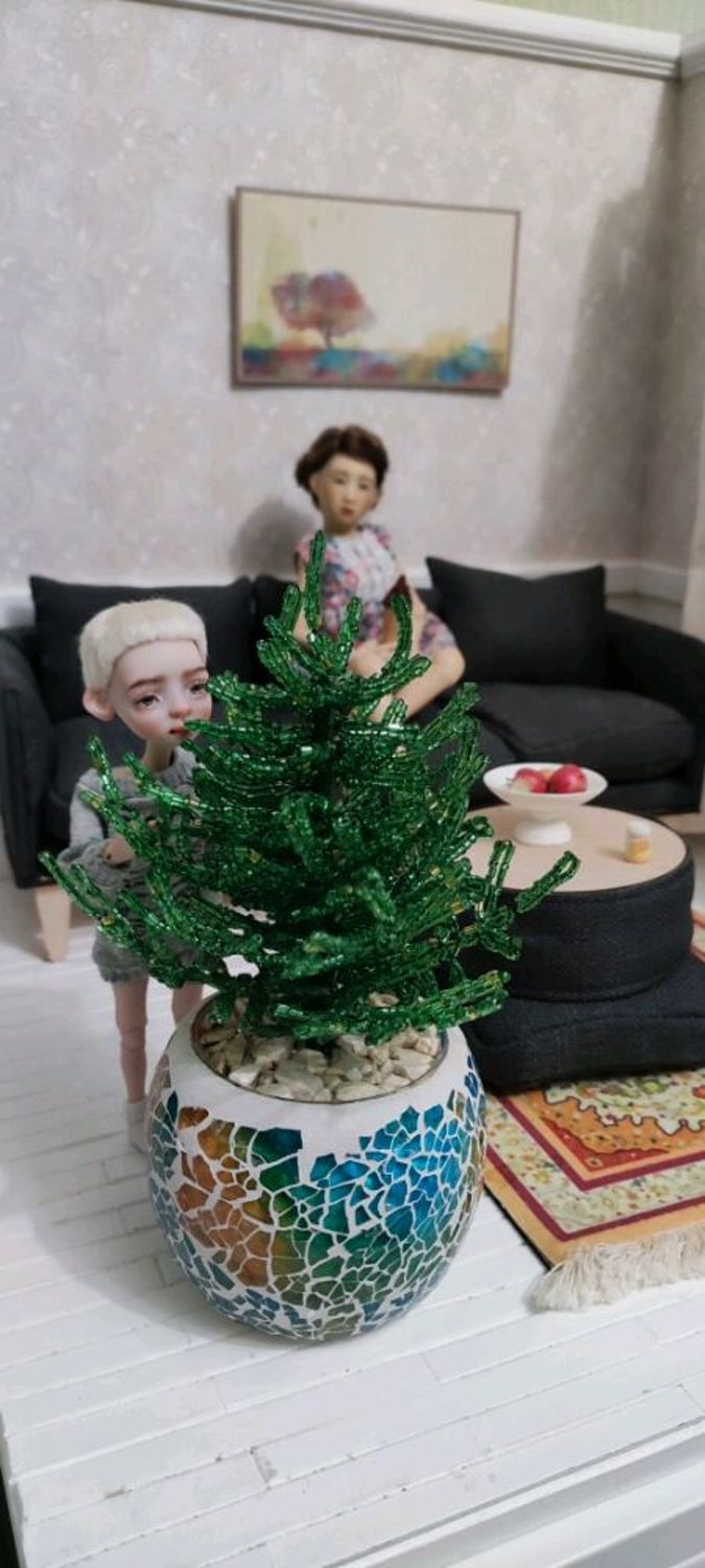 Photo №1 к отзыву покупателя Svetlana о товаре Елка из бисера ручной работы настольная в красивом горшочке
