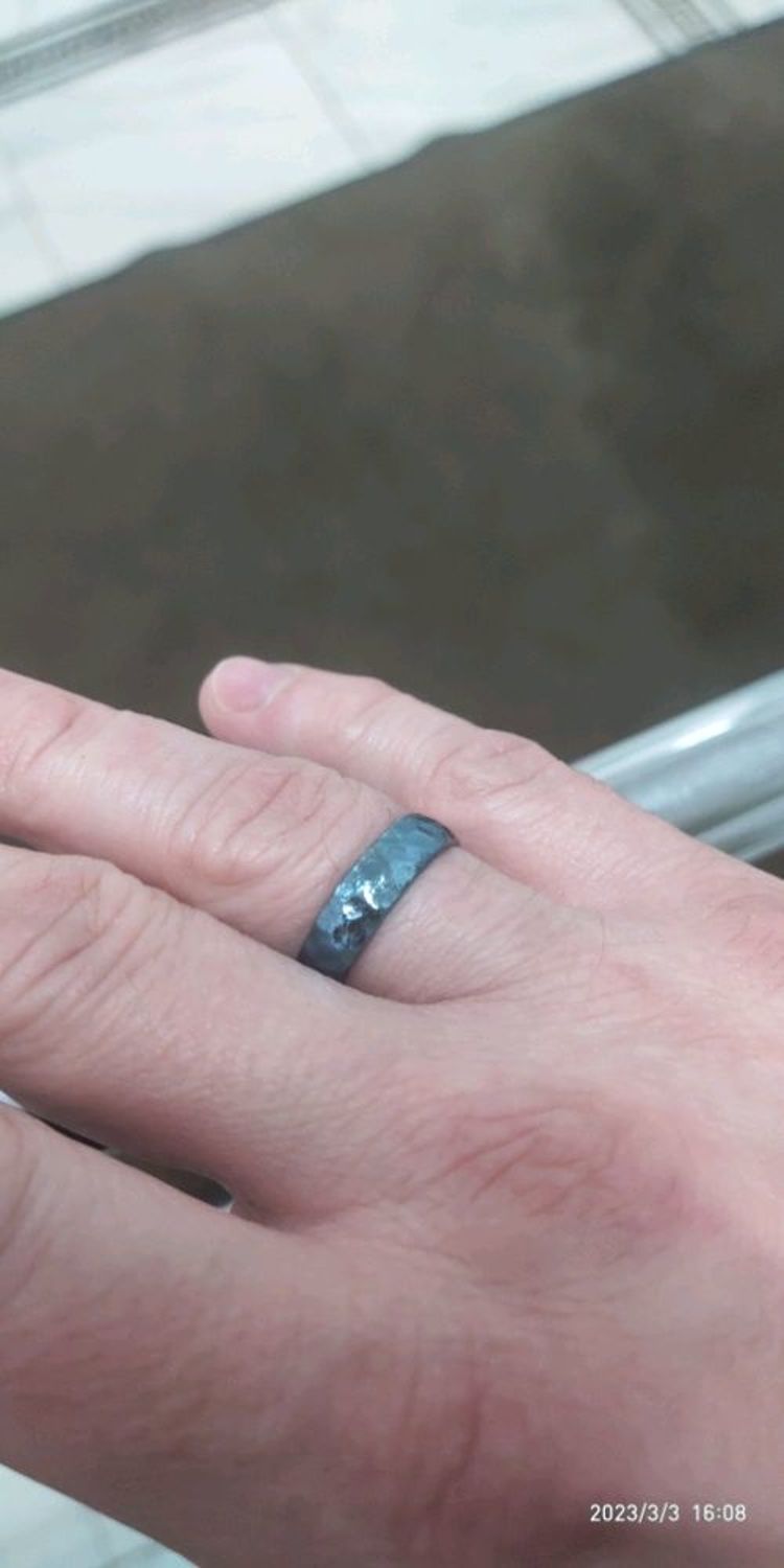 Photo №1 к отзыву покупателя Anton B о товаре Синие титановые кольца. Необычные обручальные кольца