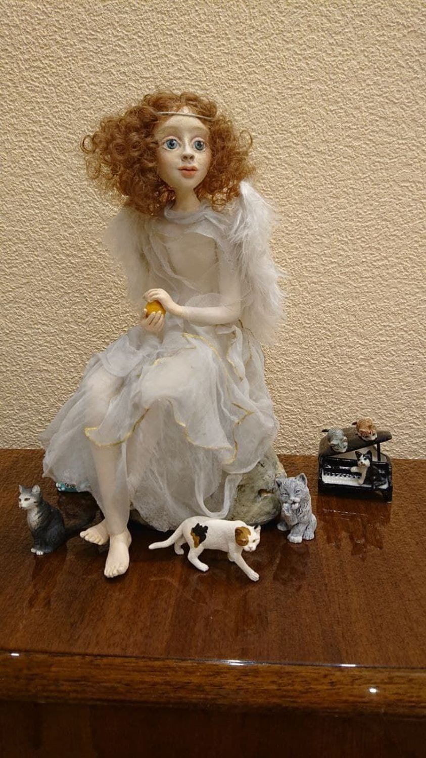 Photo №1 к отзыву покупателя Izyumov Nikolaj о товаре Ангел с апельсином. Авторская кукла