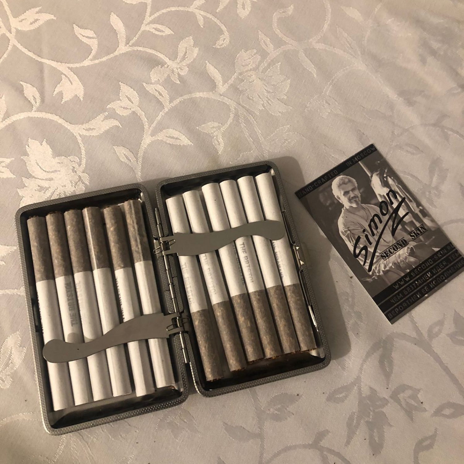 Фото №1 к отзыву покупателя Дарья Сурудина о товаре Портсигар для сигарет 10 см. страус чёрный
