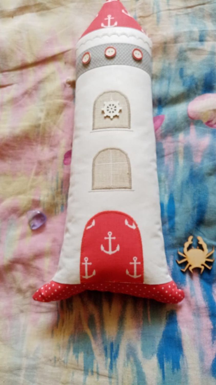 Фото №1 к отзыву покупателя Семененков Алексей о товаре Подушка-игрушка "Маяк", подушки маяки, маяк из ткани