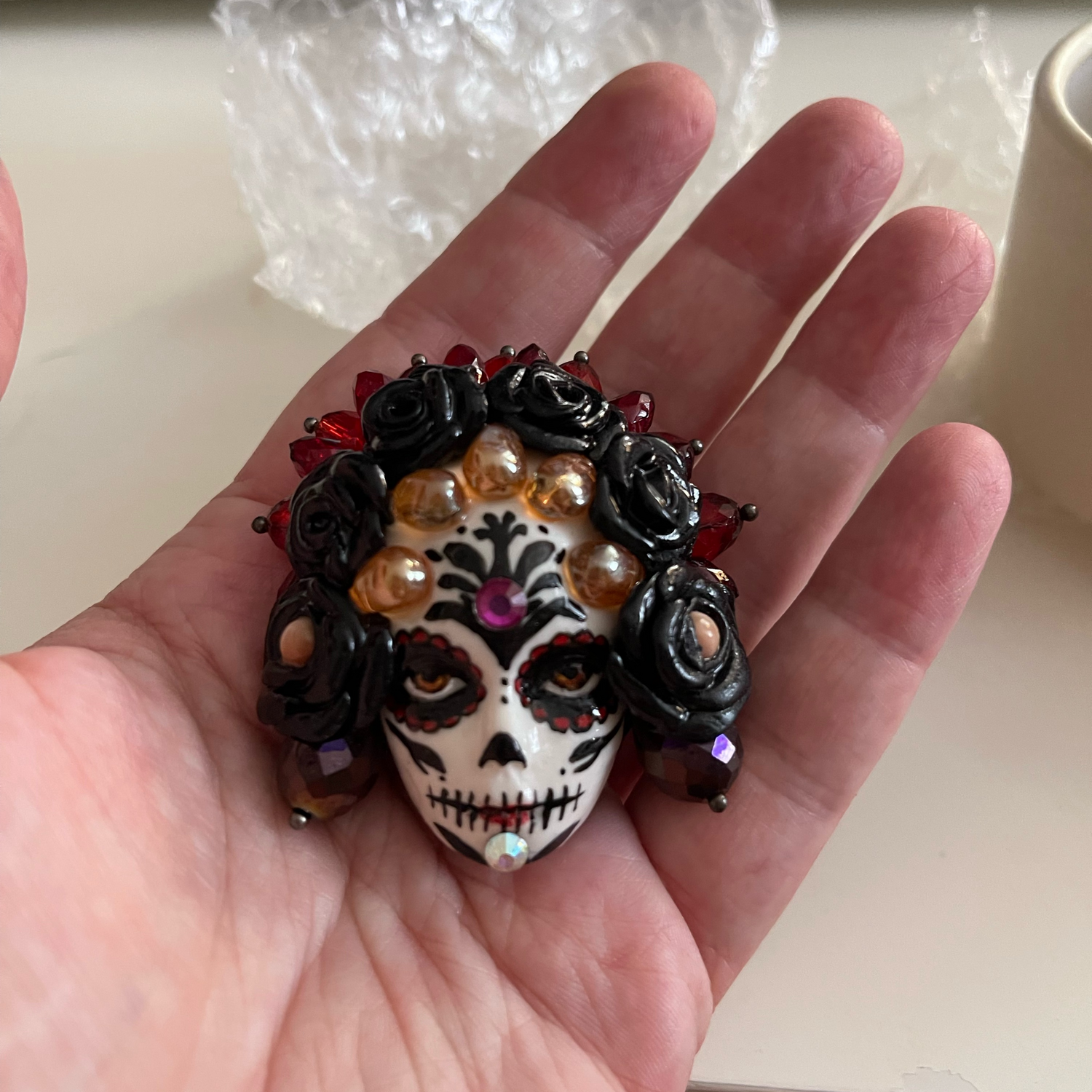 Фото №1 к отзыву покупателя Федюкина Алла о товаре Брошь "Santa Muerte"