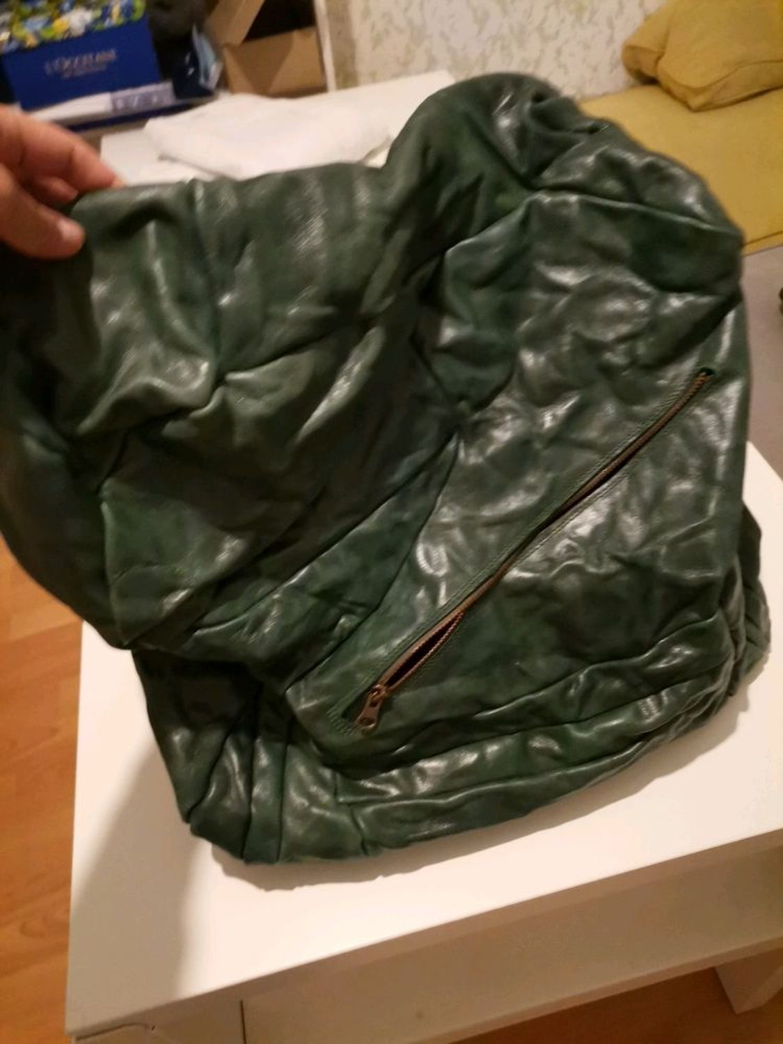 Фото №1 к отзыву покупателя Марина о товаре Рюкзак, натуральная кожа, Emerald backpack "Shape-Shifting"