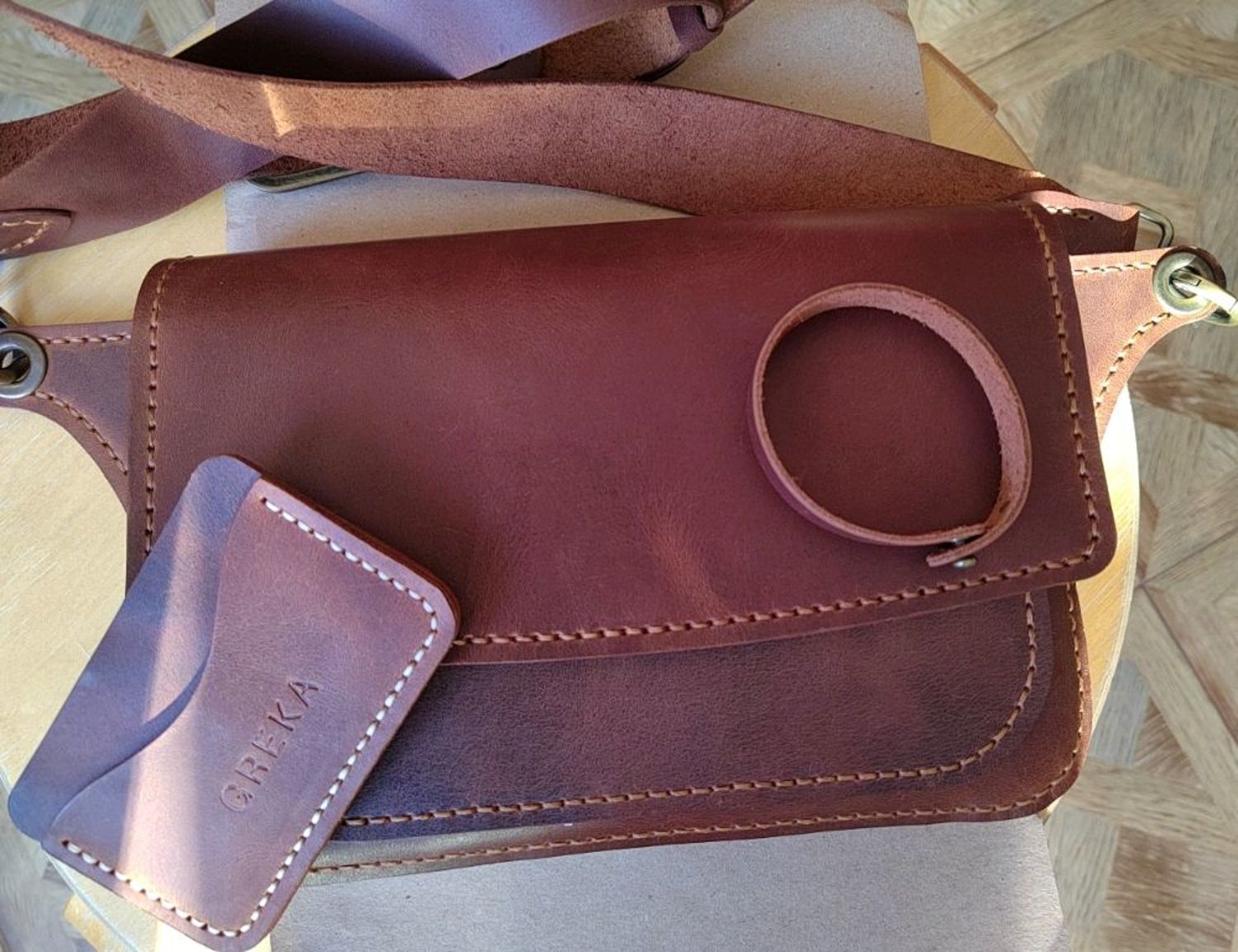 Фото №1 к отзыву покупателя Евгения о товаре Женская кожаная наплечная сумка с широким ремнем