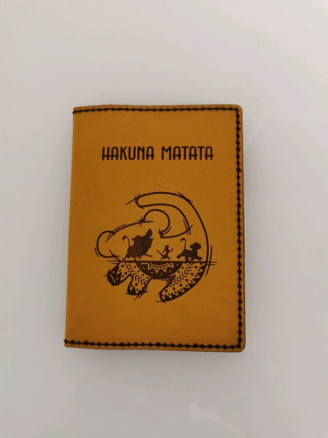 Фото №1 к отзыву покупателя Мария о товаре Обложка для паспорта Акуна Матата