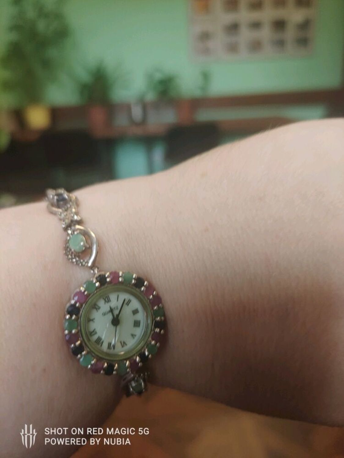 Фото №1 к отзыву покупателя Анна о товаре Серебряные часы с рубинами,изумрудами,сапфирами и марказитами