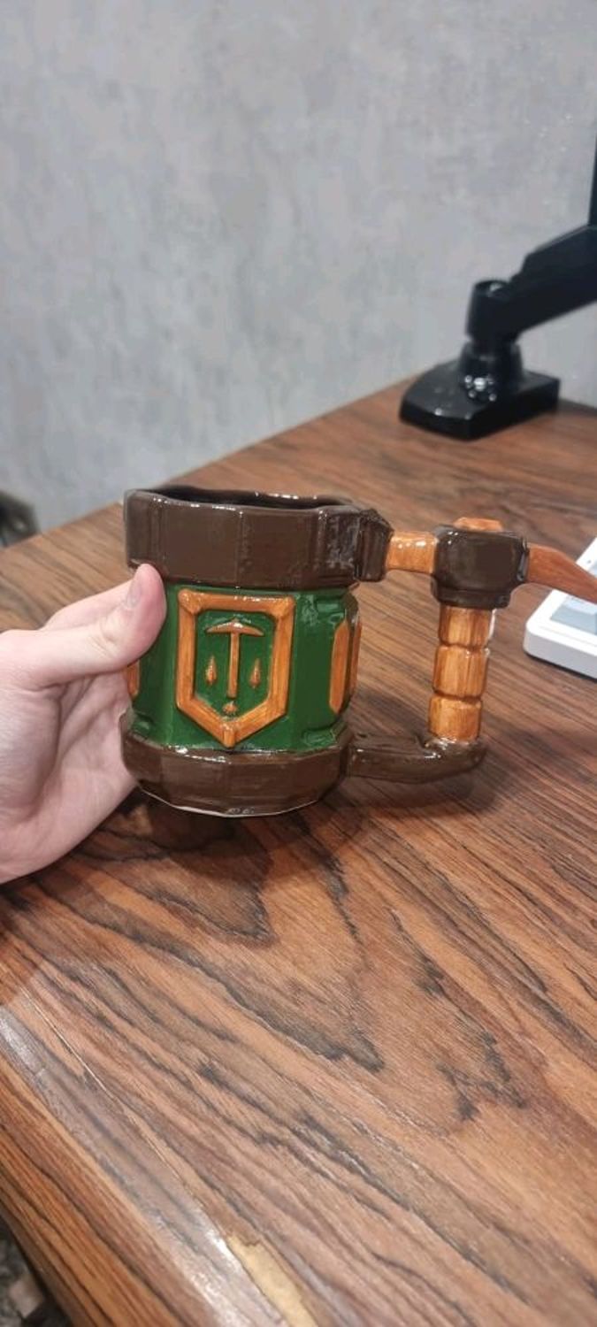 Фото №1 к отзыву покупателя Polina Koval о товаре Кружка рудокопа из Deep Rock Galactic/pots of gold/red rock blaster