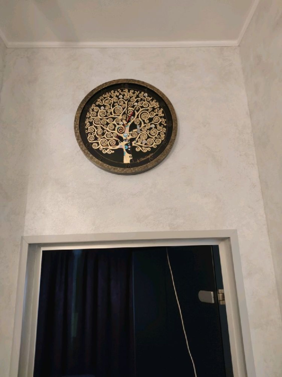 Photo №1 к отзыву покупателя Olga о товаре Часы настенные круглые "Древо жизни" в чёрном.
