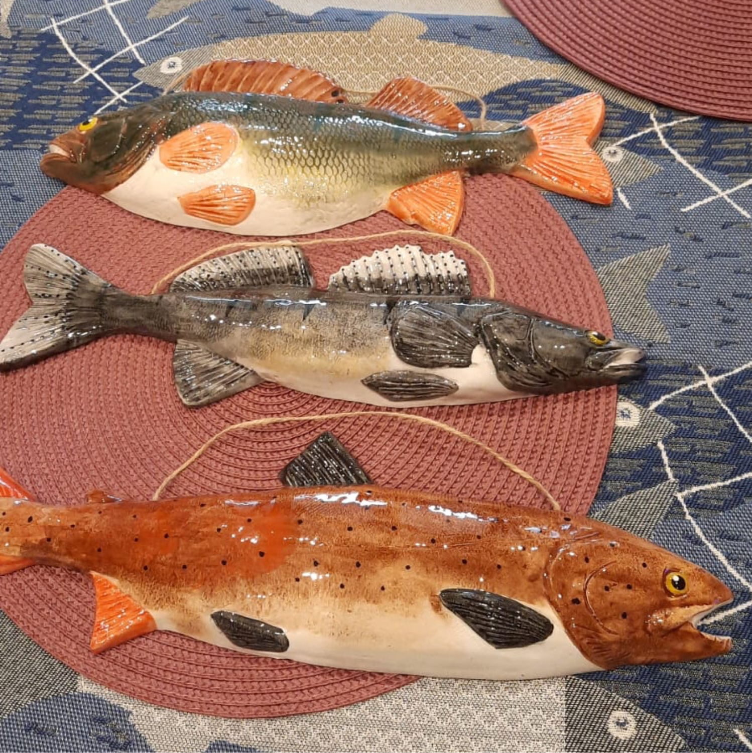 Фото №1 к отзыву покупателя Кристина Якимович о товаре Подарки для рыболовов: Керамическая рыба ручной работы Таймень и еще 2 товара