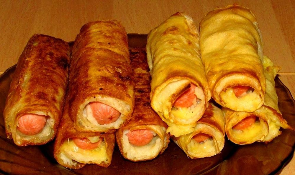 Сосиски с сыром в рисовой шубе – кулинарный рецепт