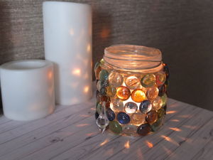 Candle with metal lid