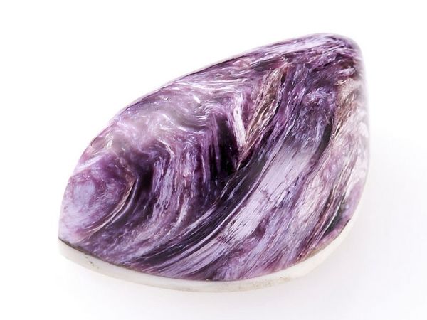 Байкальский чароит камень. Чароит розетковидный. Камень чароит значение. Камень чароит значение. Чароит.